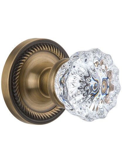 Fluted Crystal Glass Door Knob Set with Rope Design Rosettes Single Dummy in Antique Brass.